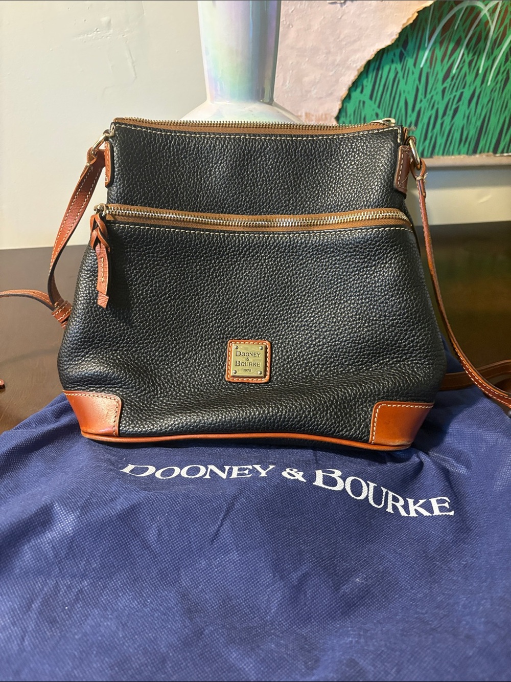 Dooney & Bourke Black with Brown Trim Pebbled Leather Crossbody